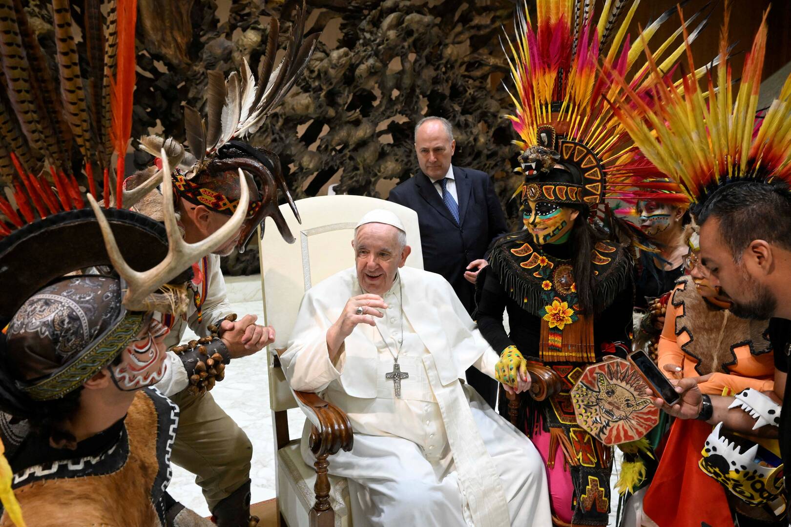 Pope Francis greets people as he arrives for his general audience in Paul VI hall at the Vatican on Aug. 10, 2022. (CNS photo/Yara Nardi, Reuters)